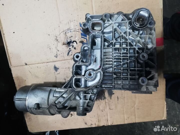 Корпус масляного фильтра Chevrolet Captiva Z22D1