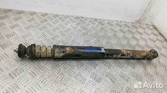 Амортизатор задней балки nissan note E11 (4BN23LX0