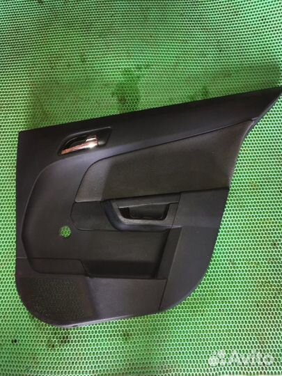 Обшивка карта двери задняя правая Opel Astra H