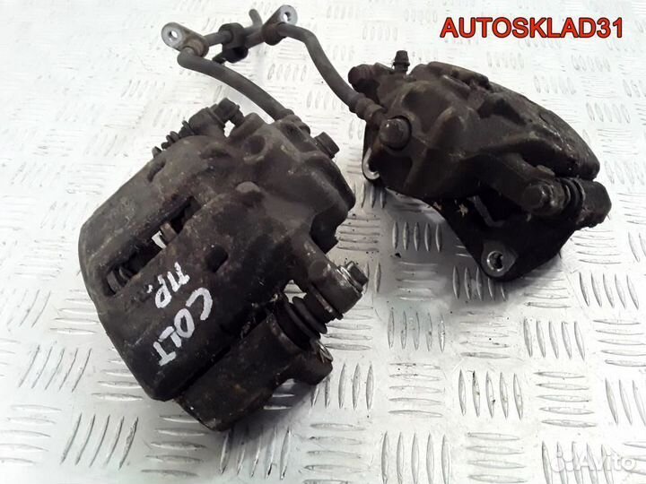 Суппорт тормозной перед. Mitsubishi Colt 4605A065