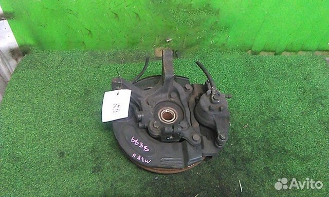 Кулак поворотный левый Mitsubishi Chariot Grandis