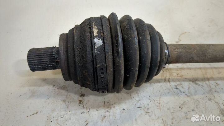 Полуось левая передняя Volkswagen Caddy