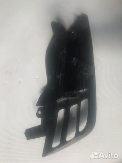 Заглушка бампера передняя правая Nissan March AK12