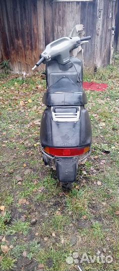 Скутер honda lead