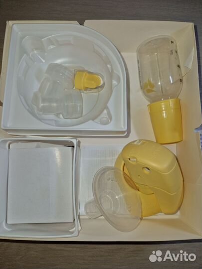 Молокоотсос medela электрический