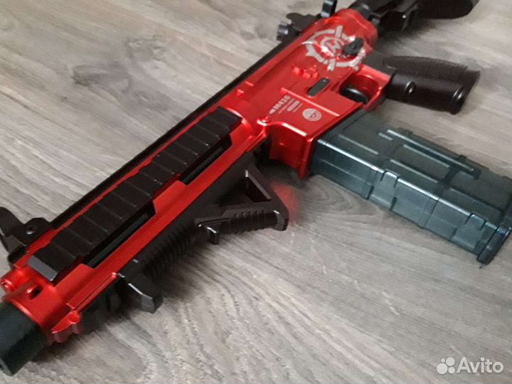 Игрушечный автомат с пульками