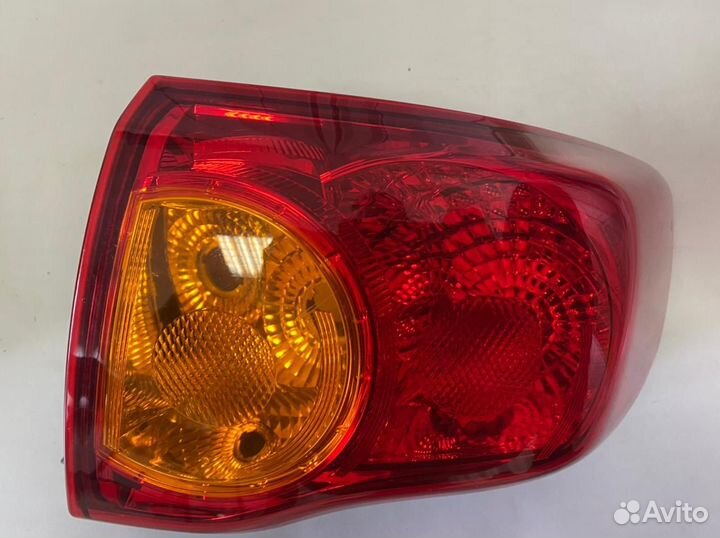 Задний фонарь Тойота Corolla E150 седан
