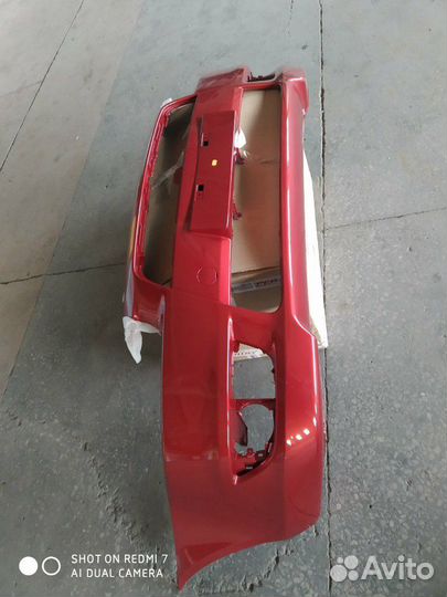 Бампер Митсубиси Лансер X новый,красный