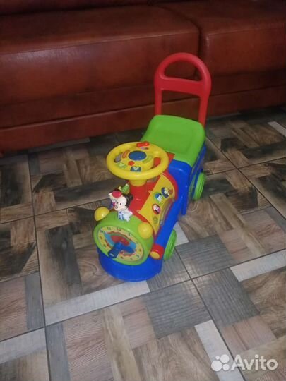 Паровозик каталка развивающий Disney