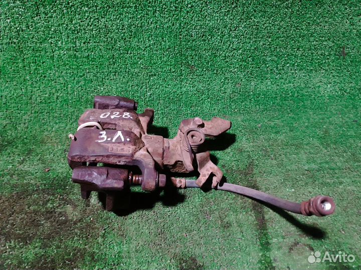 Суппорт тормозной задний левый Mazda 6