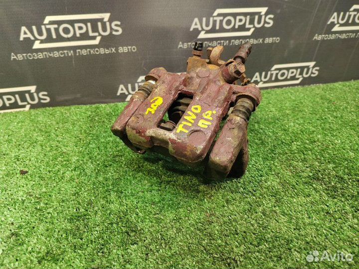 Суппорт тормозной задний правый Nissan Almera Tino