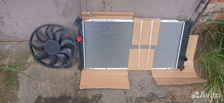 Радиатор и вентилятор охлаждения Ssang Yong aktion