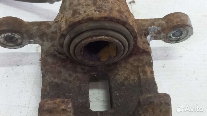 Суппорт задний левый Hyundai Tucson 2