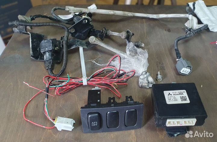 Автокорректор и AFS на Mitsubishi Lancer 10