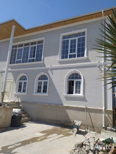 Облицовка фасада под кирпич