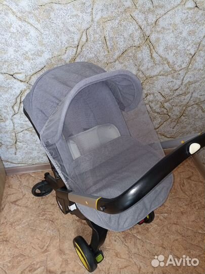 Коляска-автокресло