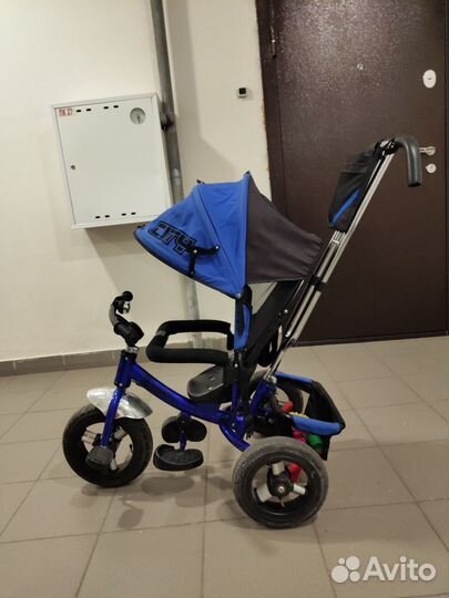 Трёхколёсный велосипед с родительской ручкой