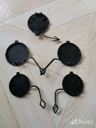 Vw passat b7 заглушка буксировки передняя