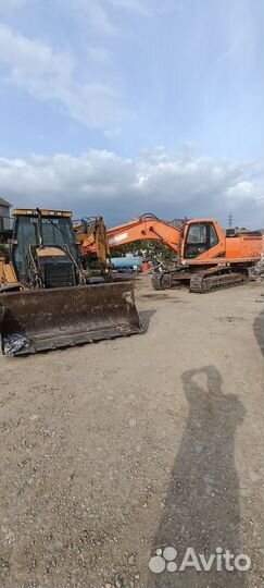 Услуги экскаватора погрузчика