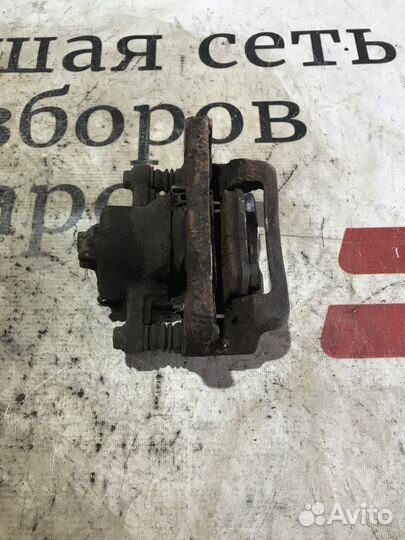 Суппорт тормозной задний левый Hyundai Santa Fe I