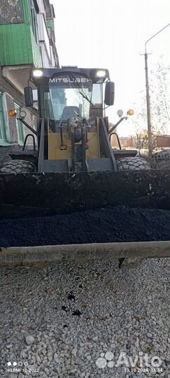 Услуги фронтального погрузчика по уборки снега