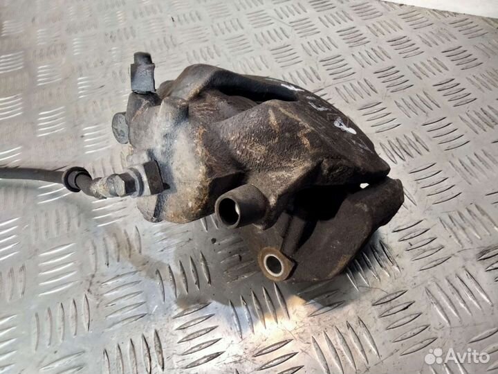 Суппорт передний левый Опель Зафира А