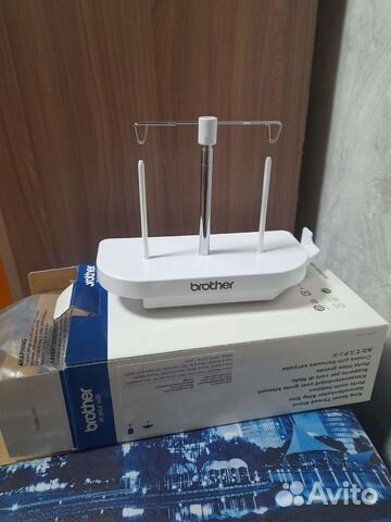 Держатель для больших катушек ниток. brother