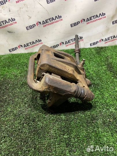 Суппорт тормозной задний левый Chevrolet Lacetti