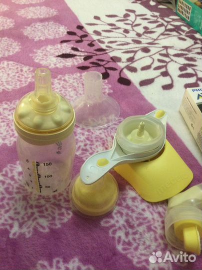 Молокоотсос weleda с бутылочкой и пакетами для сте