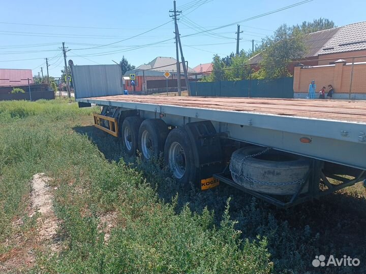 Полуприцеп бортовой МАЗ 93971, 2003