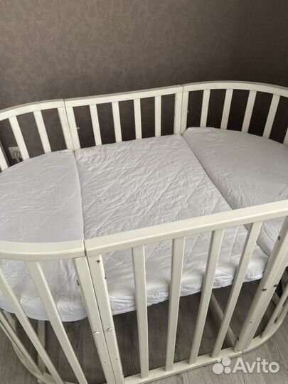 Кроватка овальная(круглая) на колесиках с матрасом