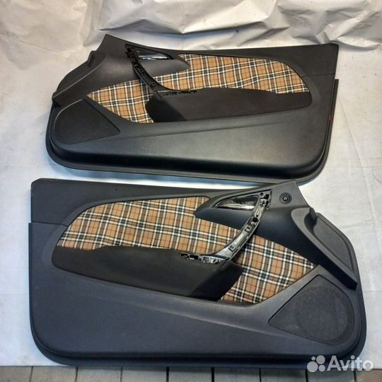 Обшивка двери Opel Astra J GTC