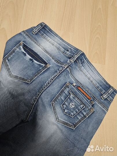 Джинсы новые