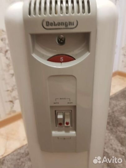 Масляный обогреватель delonghi