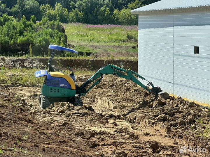 Услуги миниэкскаватора,Миниэкскаватор