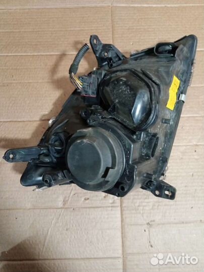 Фара передняя левая Opel Vectra C 084421129L