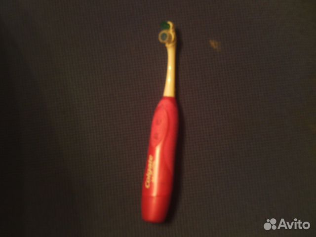 Электрическая зубная щетка колгейт