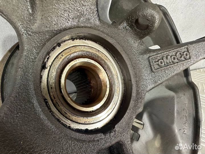 Кулак поворотный передний правый Мазда Сх7