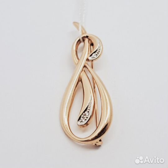 Золотая брошь с фианитом