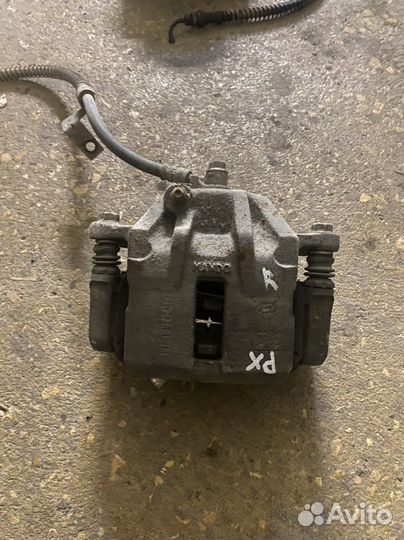 Суппорт правый hyundai elantra 3 XD