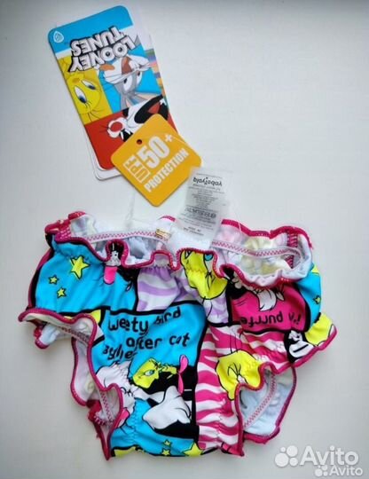 Плавки и солнцезащитный комбинезон