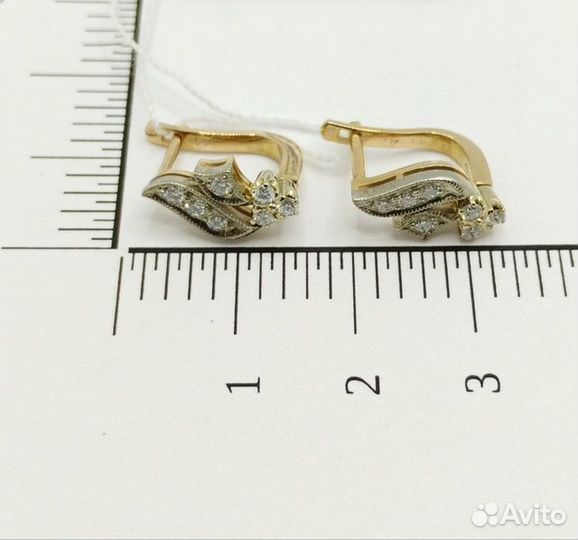 Золотые серьги с камнем