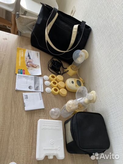 Молокоотсос medela электрический двухфазный