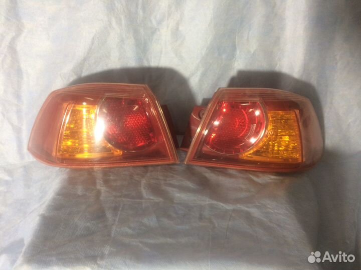 Фонарь задний левый внешний lancer X