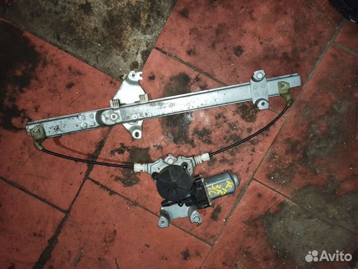 Стеклоподъемник двери передней левой Nissan Almera