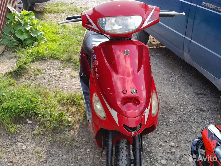 Скутер Omaks motors