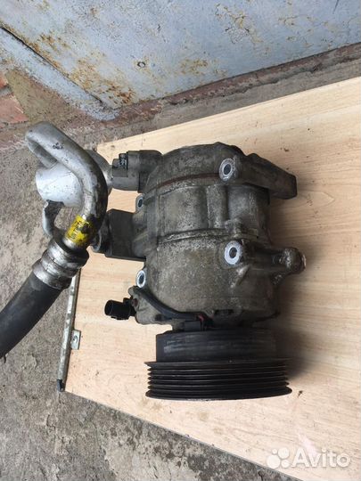 Компрессор кондиционера Kia Carens