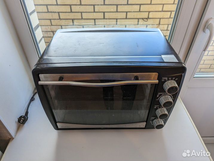 Электропечь Rolsen KW-3526