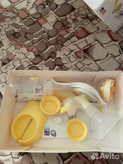 Молокоотсос medela ручной