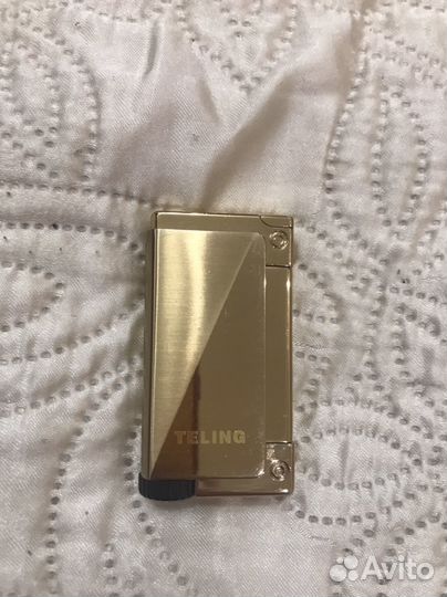 Зажигалка teling